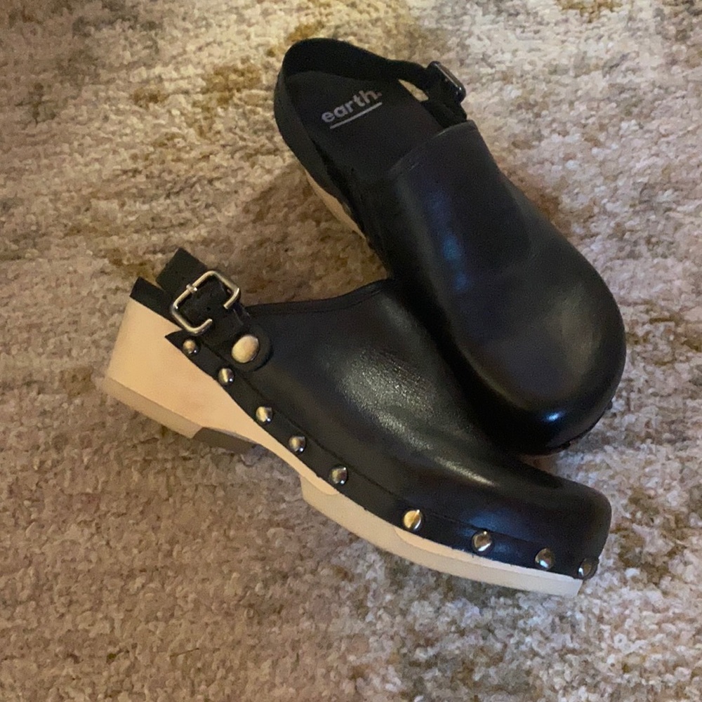 Black leather studded clogs